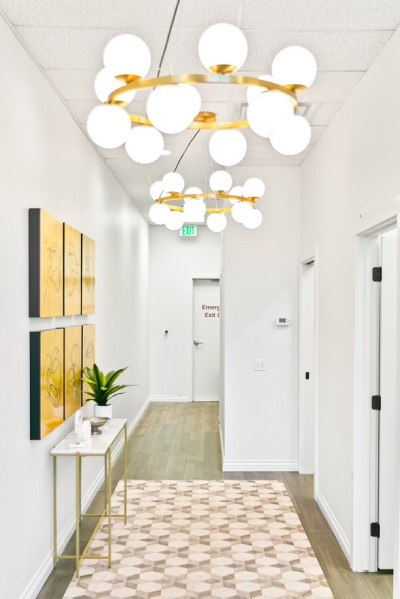 Aesthetic beauty office inside view with framed arts on wall